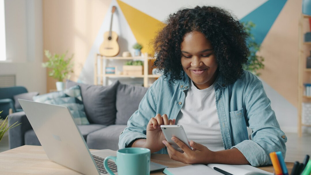 young person budgeting at home