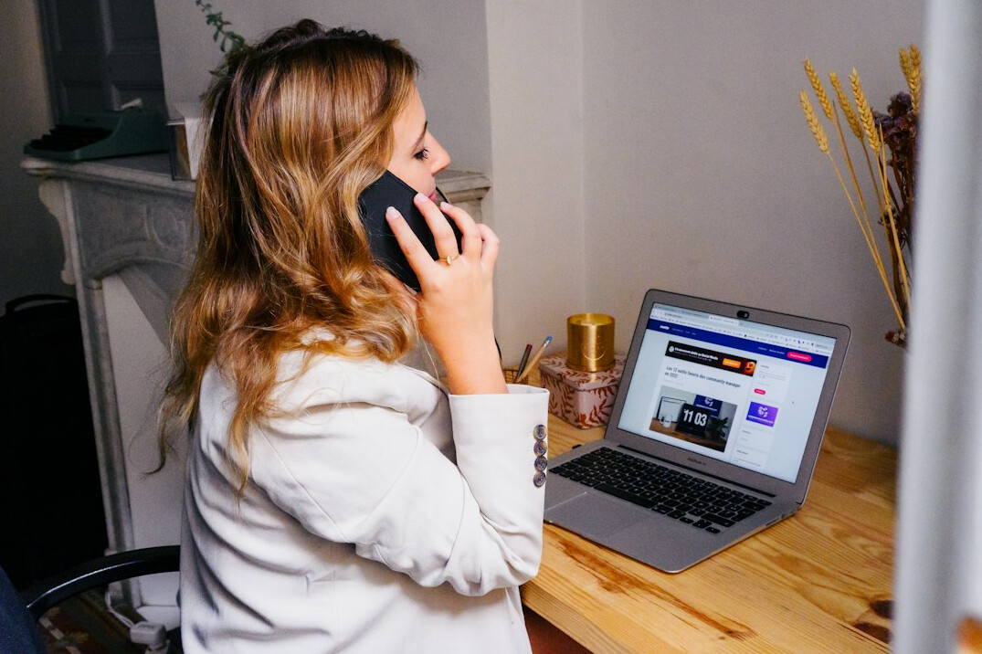 person negotiating on phone